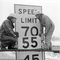 Speed-limit-sign-being-changed